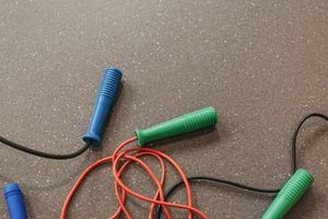 Detail of a jumping rope on the floor.